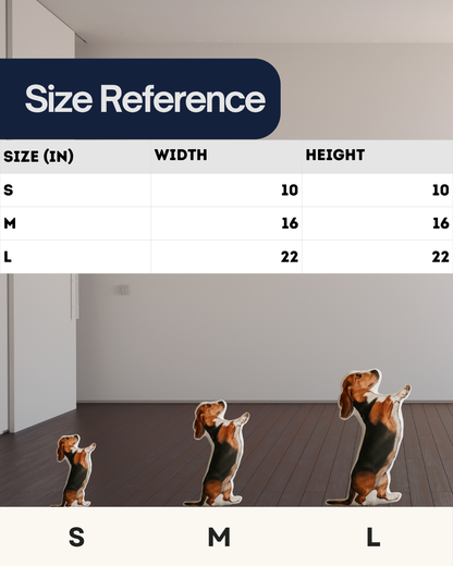 Size reference chart showing three cardboard cutouts of a beagle dog in small (S), medium (M), and large (L) sizes. Each size is labeled with its width and height in inches: S (10x10), M (16x16), L (22x22). The cutouts are displayed on a wooden floor against a plain wall background